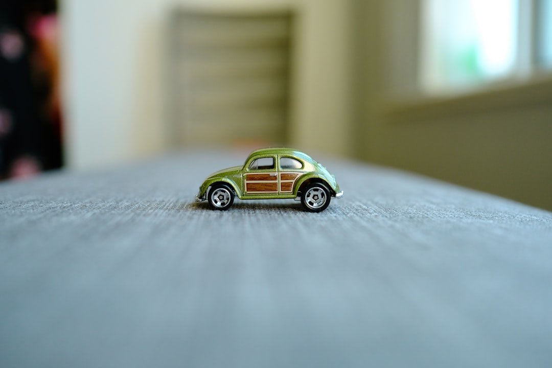 a small toy car sitting on top of a table