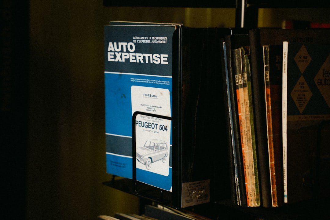 A stack of books sitting on top of a shelf