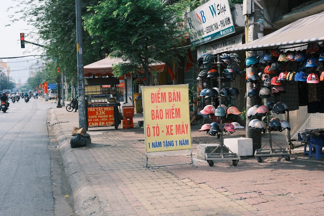 A street scene with a store and a motorcycle