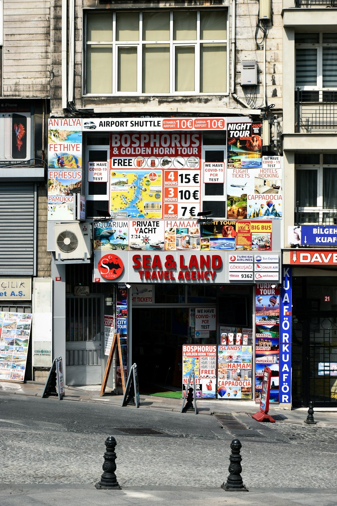 a building with many signs on the front of it