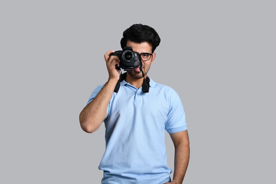 a man holding a camera