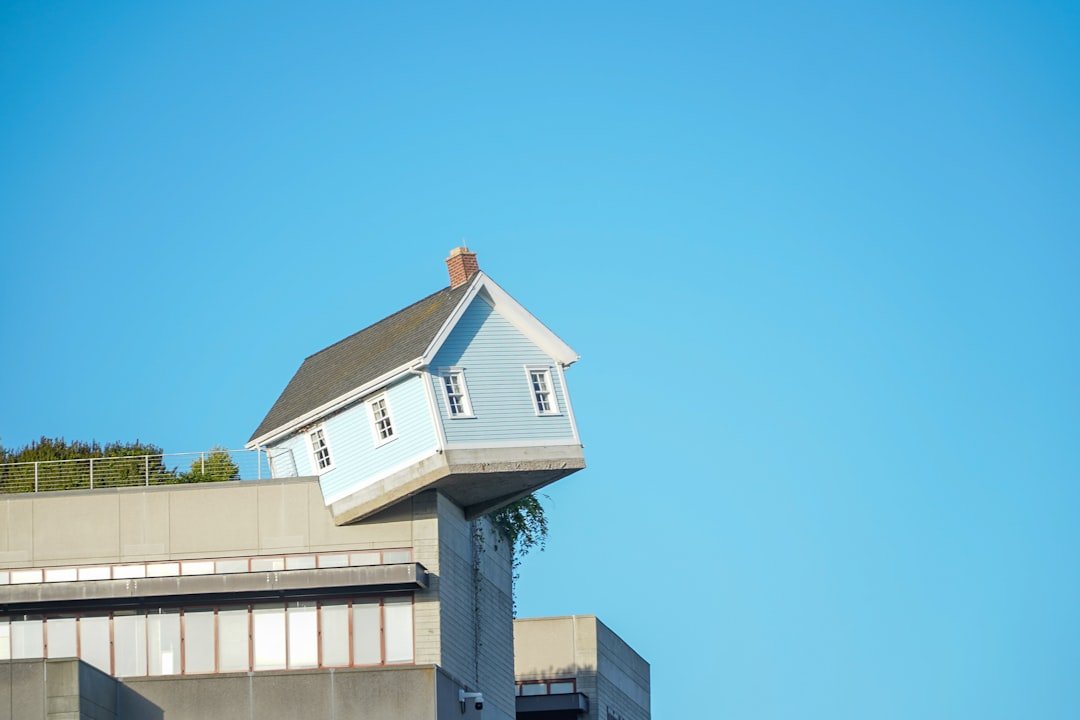 white and brown concrete building under blue sky during daytime
