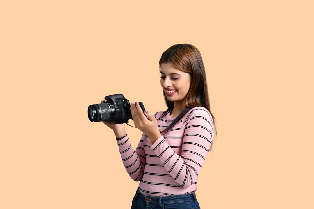 a person holding a camera