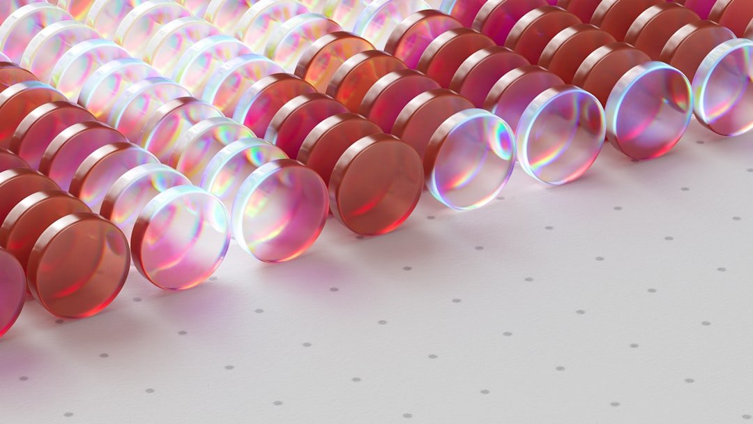 Rows of colorful, transparent orbs are arranged.