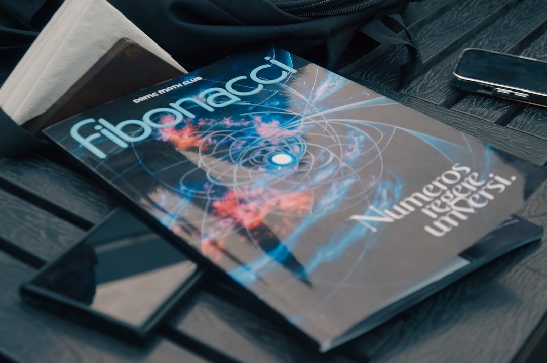 A book sitting on top of a wooden table