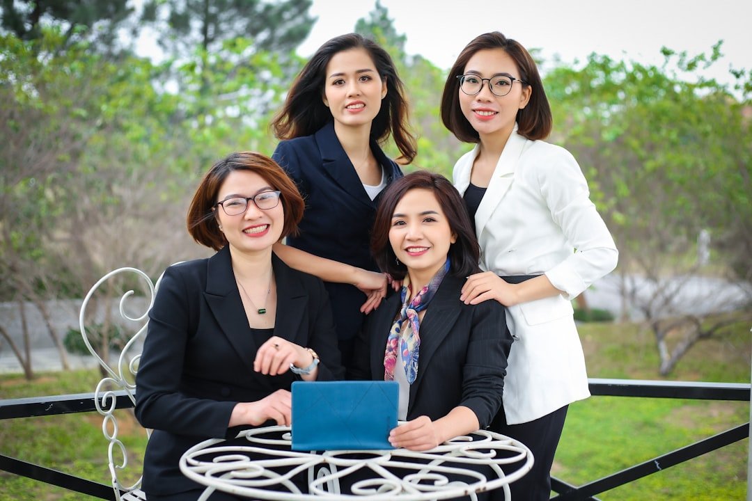 a group of women posing for a photo