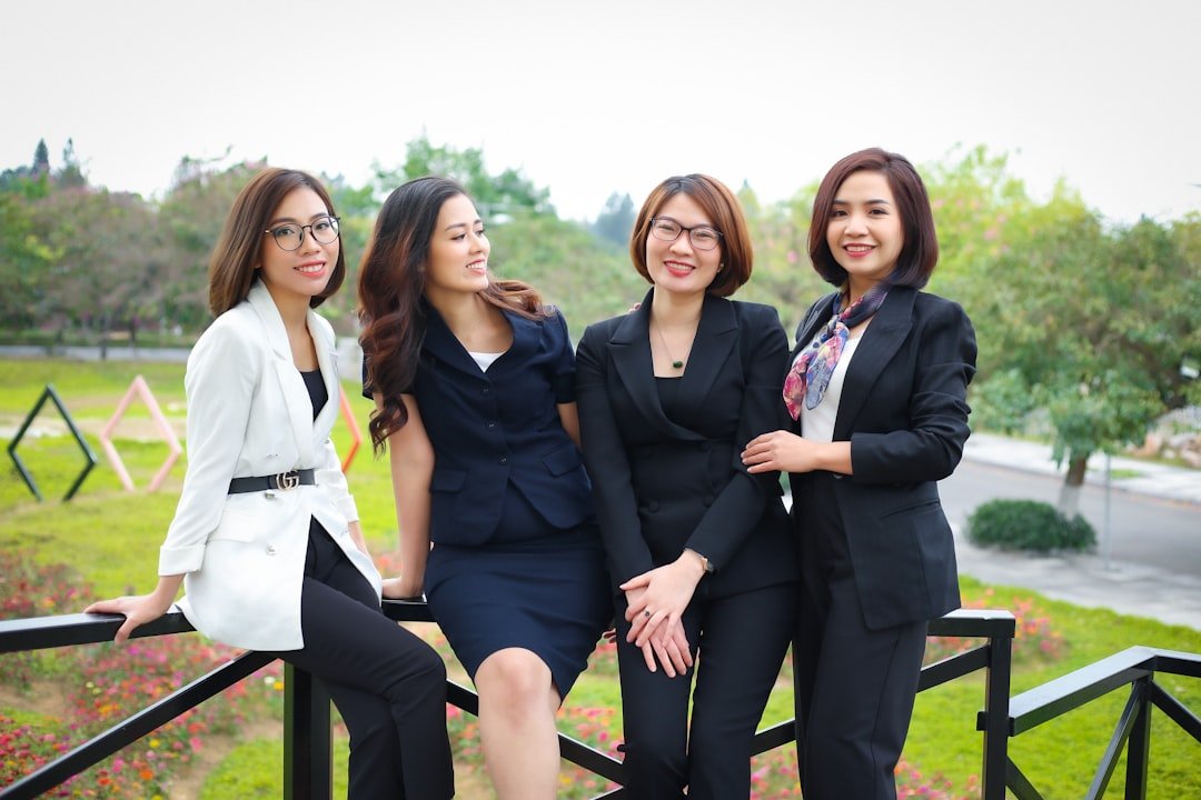a group of women posing for a photo