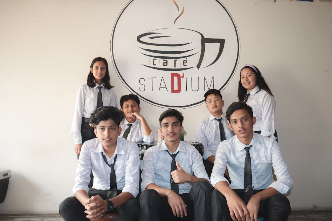 group of people wearing white dress shirts