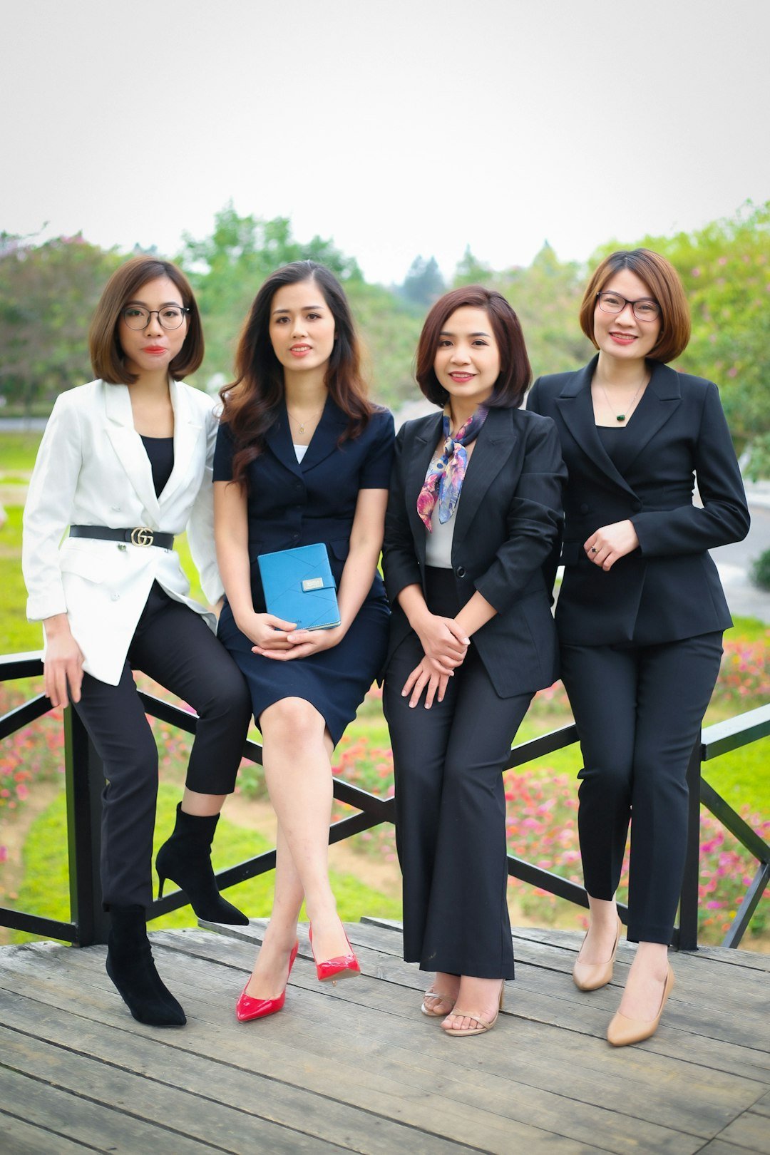 a group of women posing for a photo